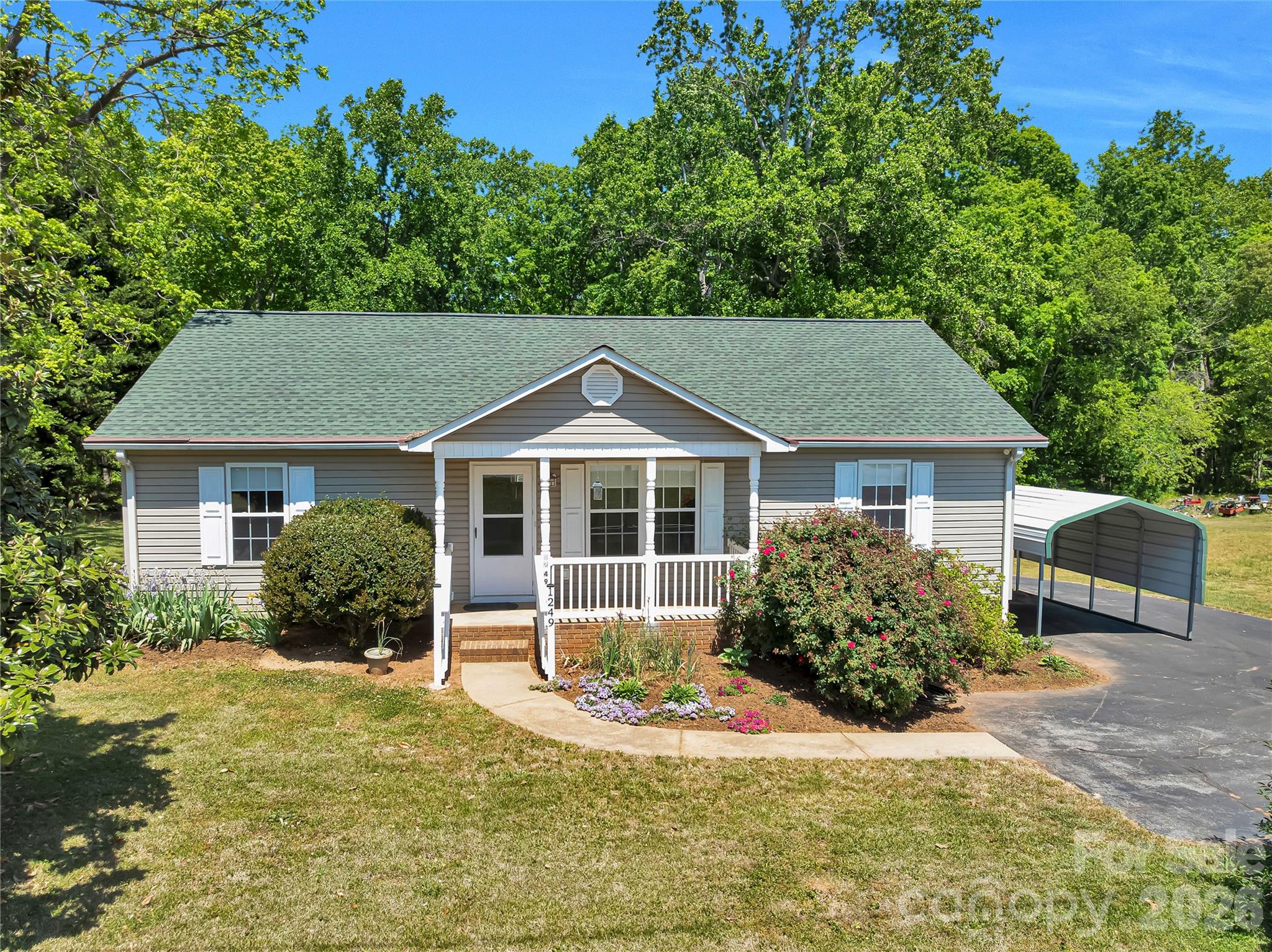 1249 Melvin Hill Road Campobello, SC 29322 - Photo 41 of 41 a front view of a house with a yard