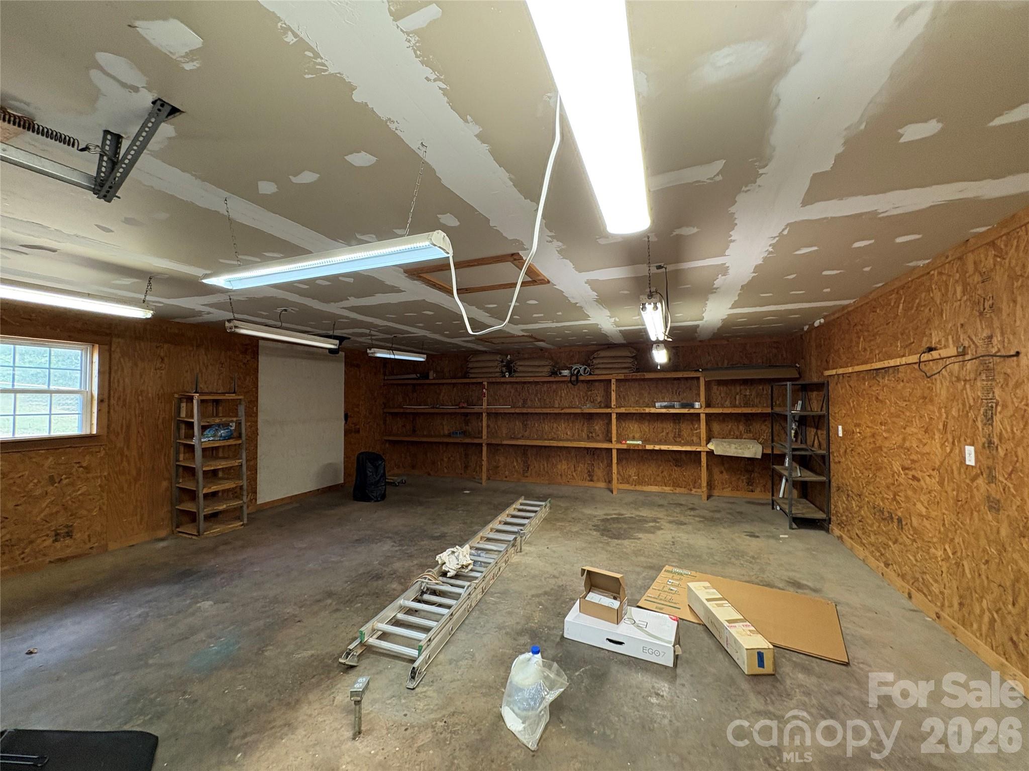 1249 Melvin Hill Road Campobello, SC 29322 - Photo 8 of 41 a view of a room with wooden shelves