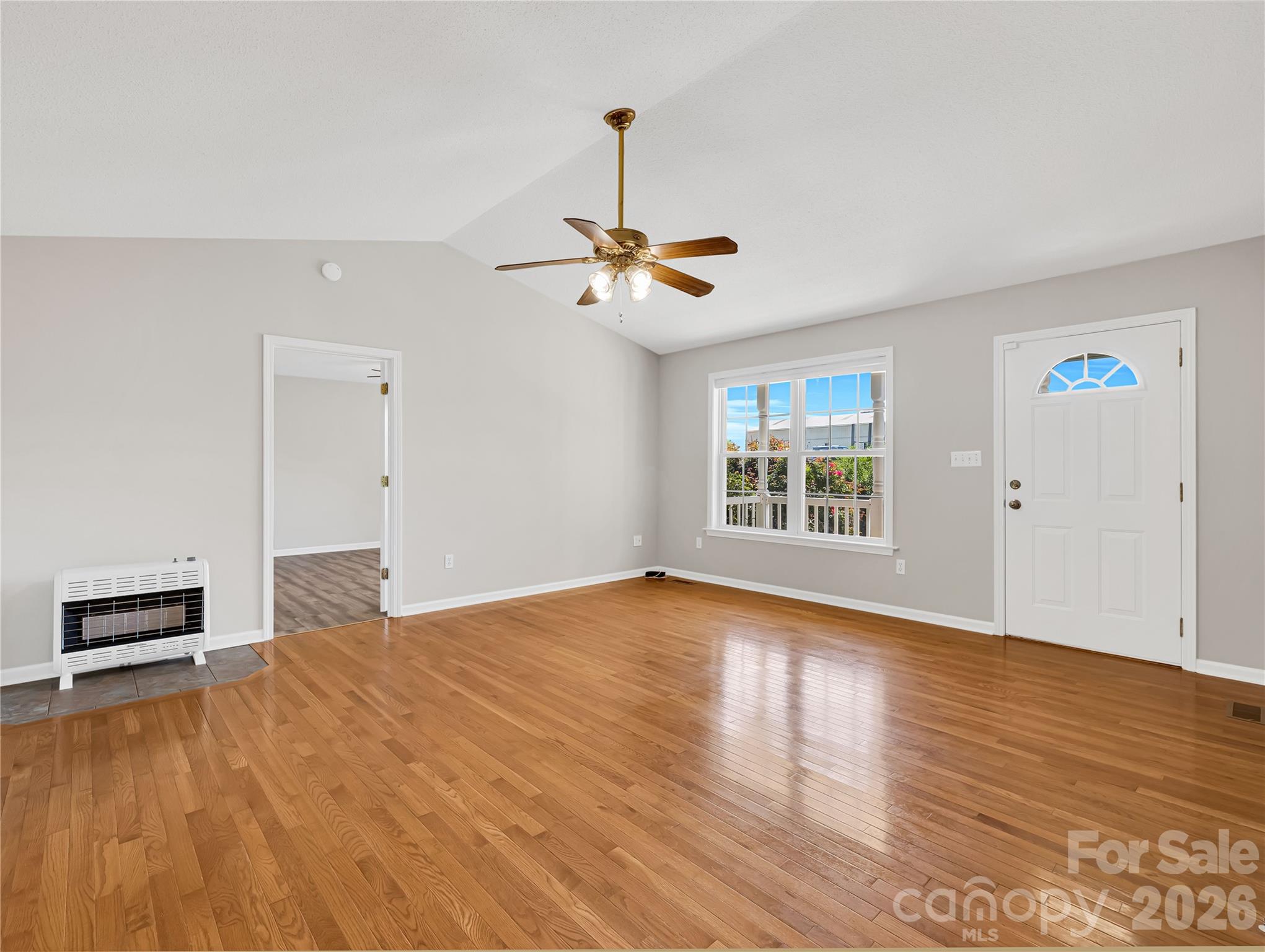 1249 Melvin Hill Road Campobello, SC 29322 - Photo 10 of 41 a view of a livingroom with a ceiling fan and window