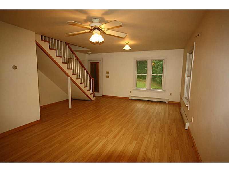 3 Carlisle Road Boothbay, ME 04537 - Photo 7 of 22 Living Room. The large front to back...