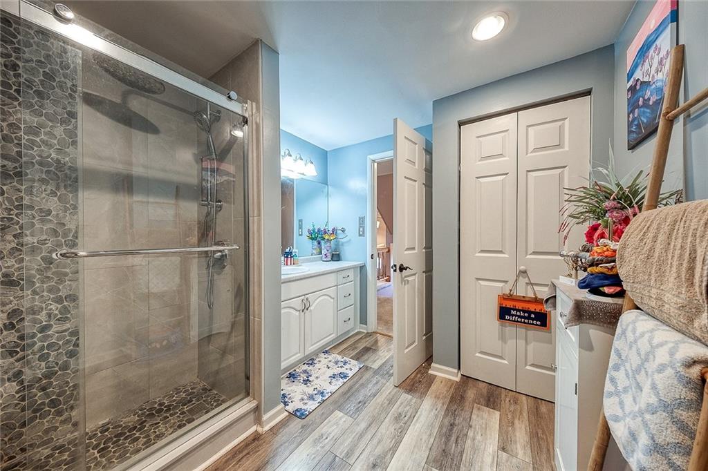 685 Blue Ridge Road Pittsburgh, PA 15239 - Photo 12 of 32 The glass shower in the master bathroom is modern and stunning.