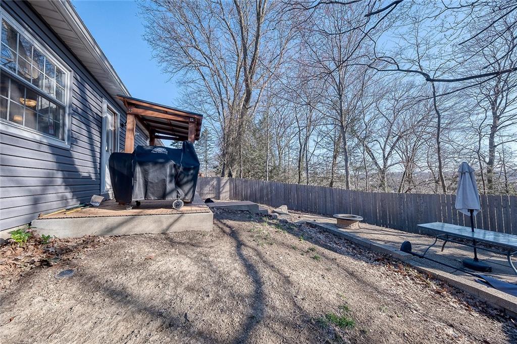 685 Blue Ridge Road Pittsburgh, PA 15239 - Photo 28 of 32 The back yard has a stone patio and firepit.