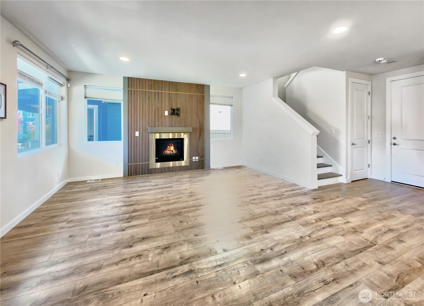 9849 6th Place Southwest Seattle, WA 98106 - Photo 11 of 21 a view of a livingroom with wooden floor and staircase