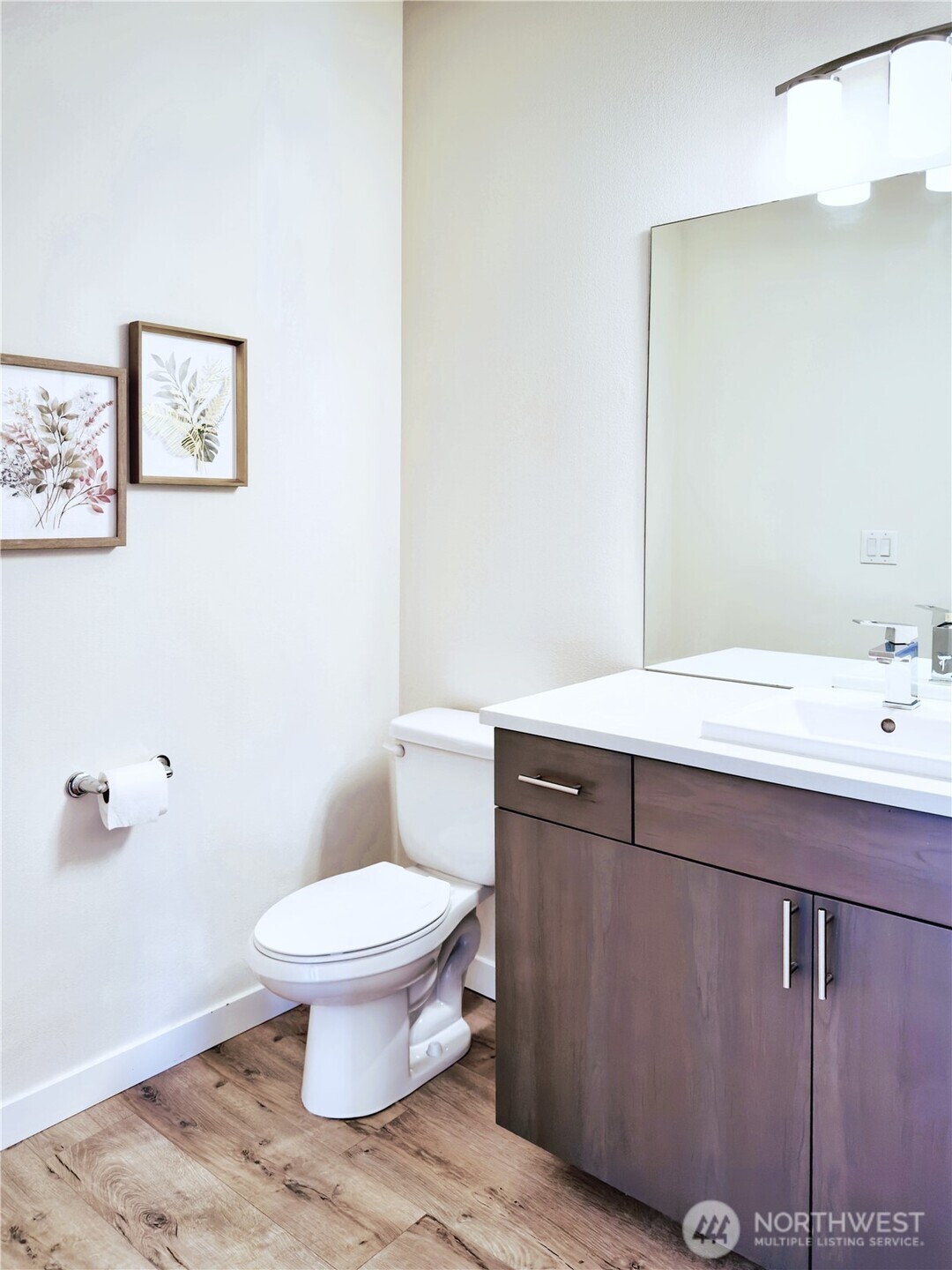 9849 6th Place Southwest Seattle, WA 98106 - Photo 21 of 21 a bathroom with a sink toilet and vanity