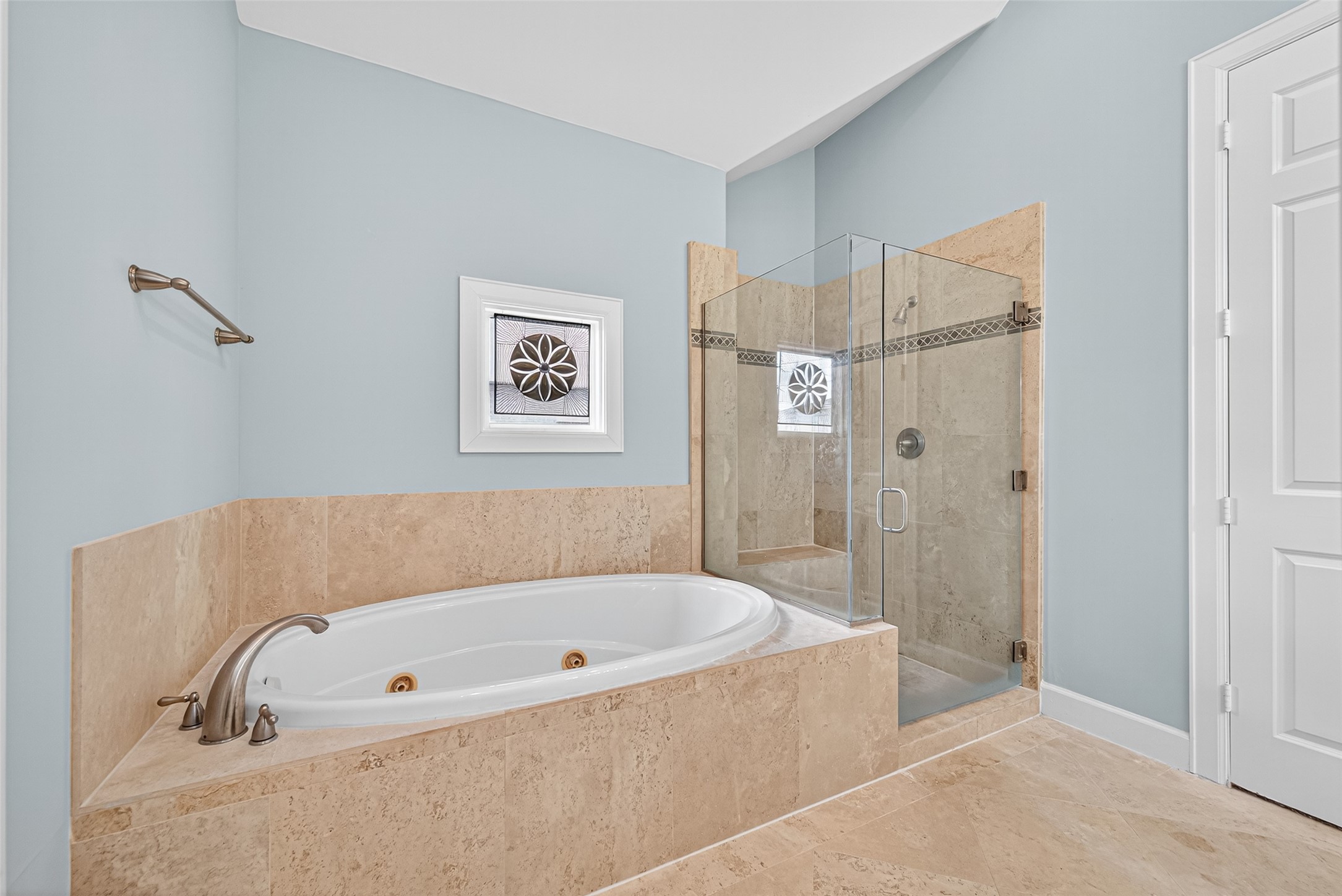 2624 Helena Street Houston, TX 77006 - Photo 19 of 33 a bathroom with a tub and shower