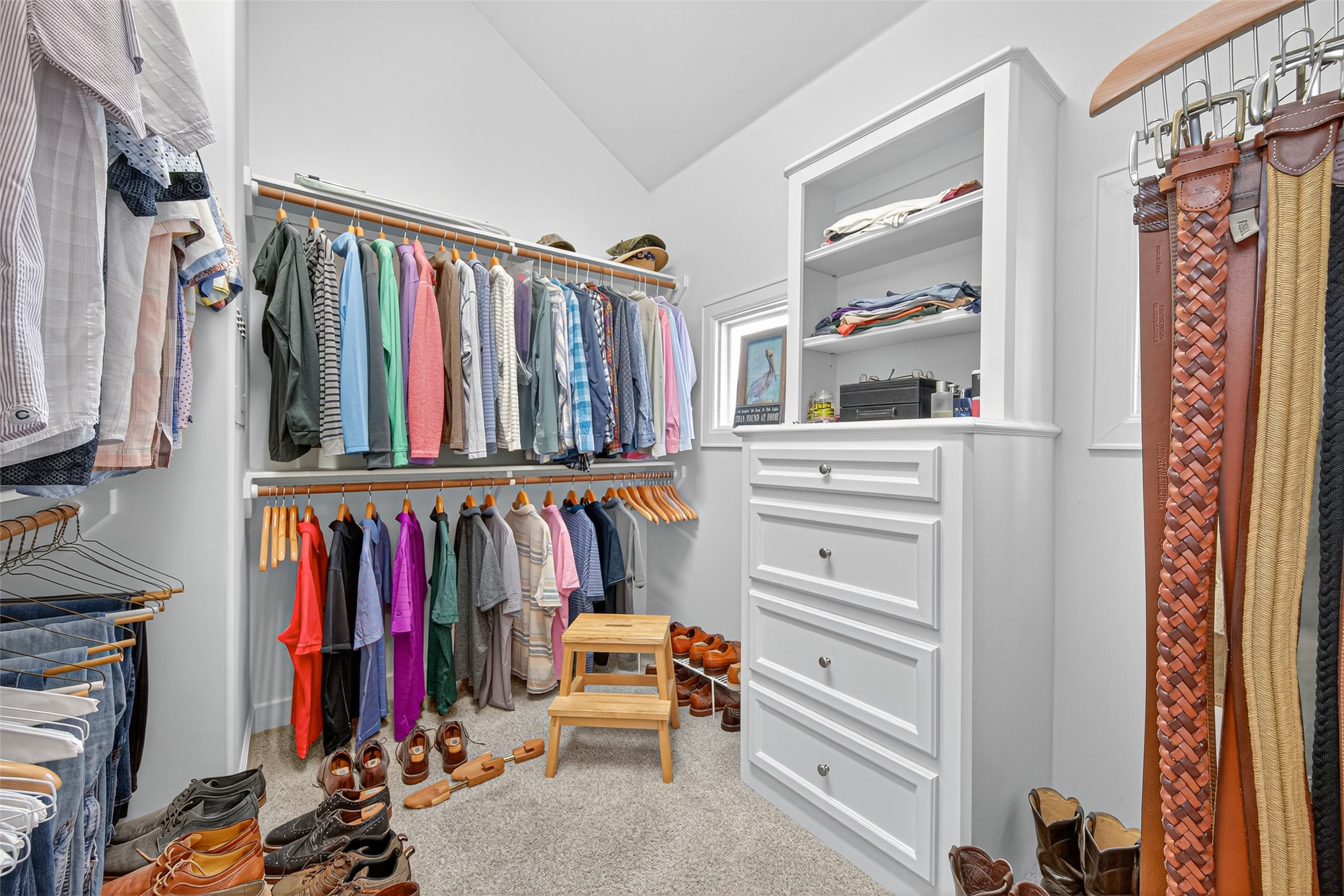 2624 Helena Street Houston, TX 77006 - Photo 21 of 33 a view of walk in closet with clothes and shoes