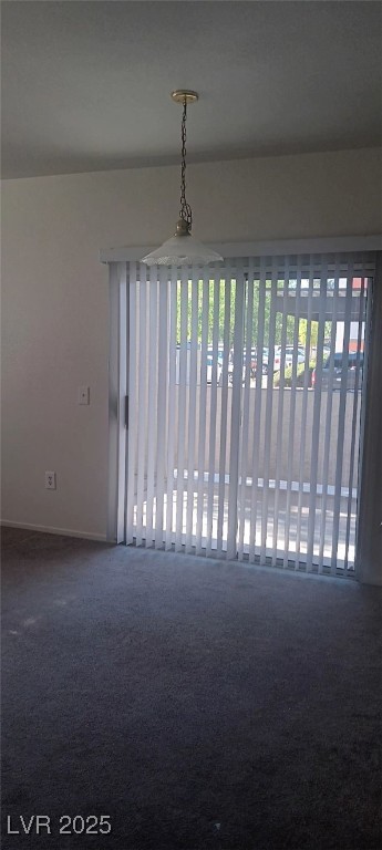 7413 West Russell Road, Unit 107 Las Vegas, NV 89113 - Photo 8 of 48 Spare room featuring healthy amount of natural light and baseboards