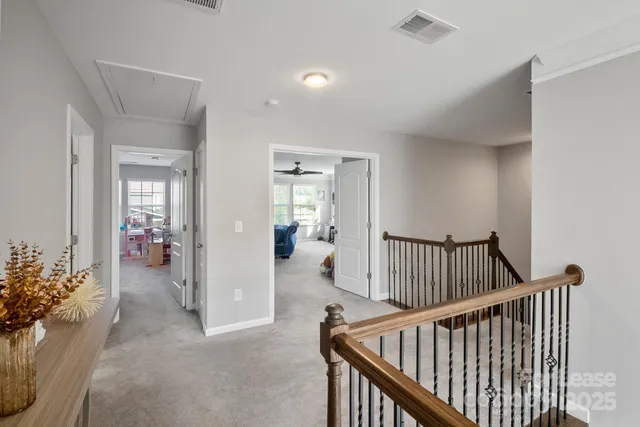 a view of hallway with livingroom