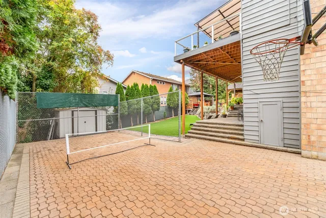 a view of a backyard with a garden and plants