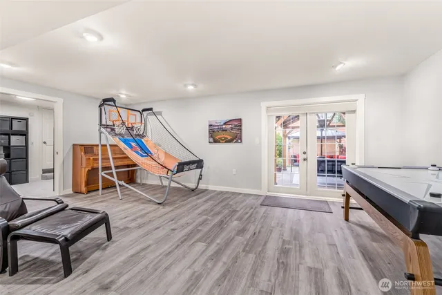 a living room with furniture and stairs