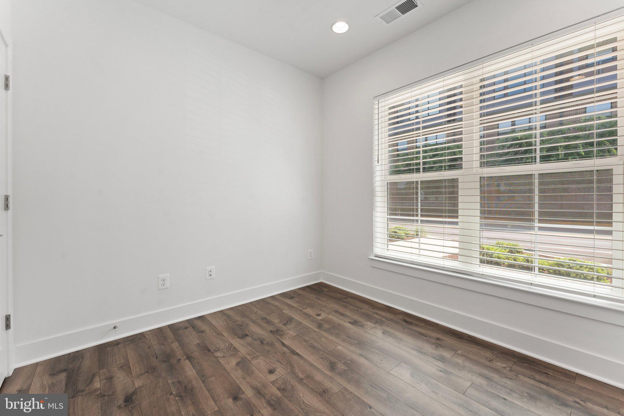 1876 Michael Faraday Drive Reston, VA 20190 - Photo 7 of 58 lower level living room