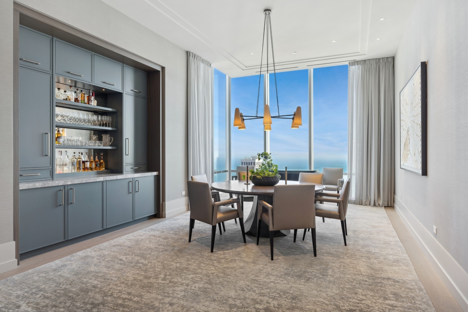 14 West Superior Street, Unit 7100 Chicago, IL 60654 - Photo 17 of 50 a dining room with furniture and window
