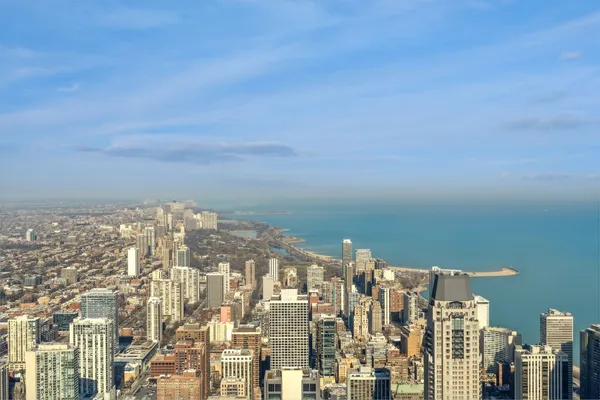 a view of a city with tall buildings