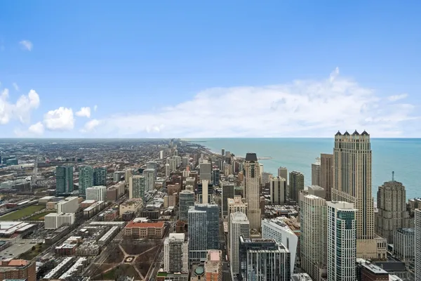 a view of a city with tall buildings in the background