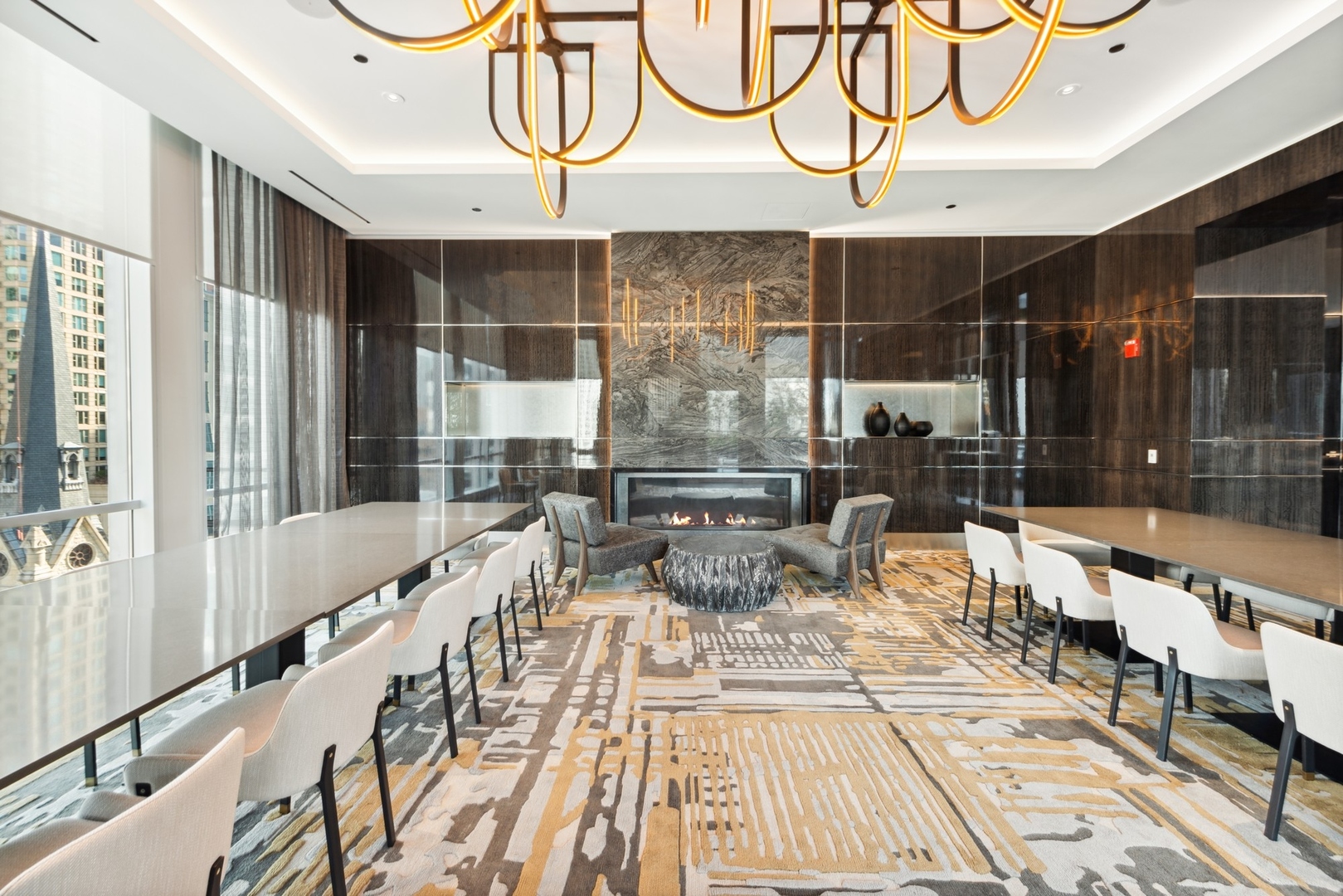 14 West Superior Street, Unit 7100 Chicago, IL 60654 - Photo 43 of 50 a outdoor space with lots of white furniture and a chandelier