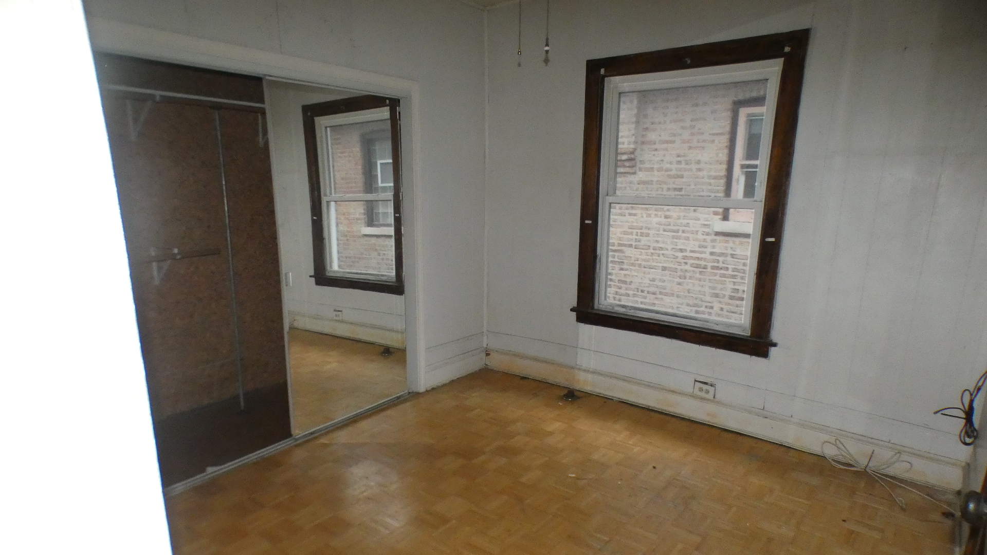 8133 South Loomis Boulevard Chicago, IL 60620 - Photo 17 of 32 a view of an empty room with windows