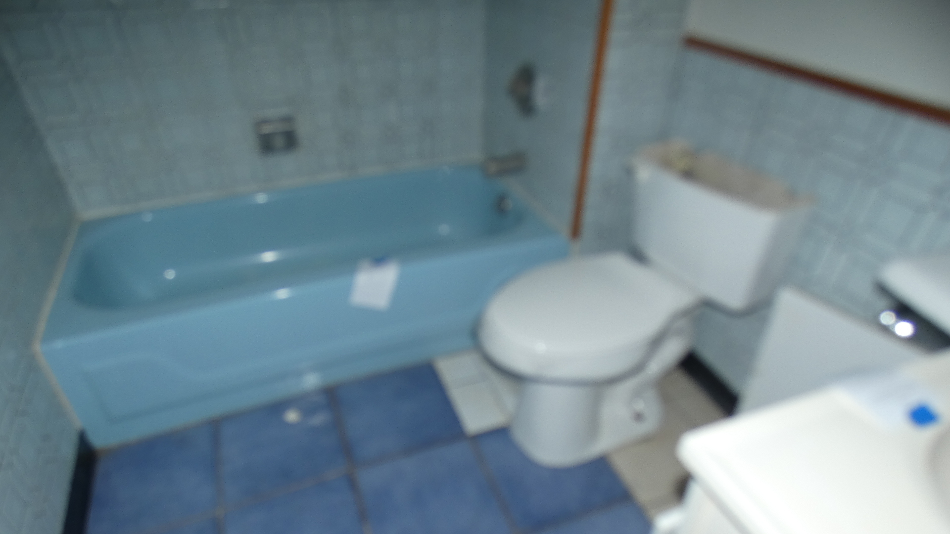 8133 South Loomis Boulevard Chicago, IL 60620 - Photo 27 of 32 a bathroom with a toilet and a shower