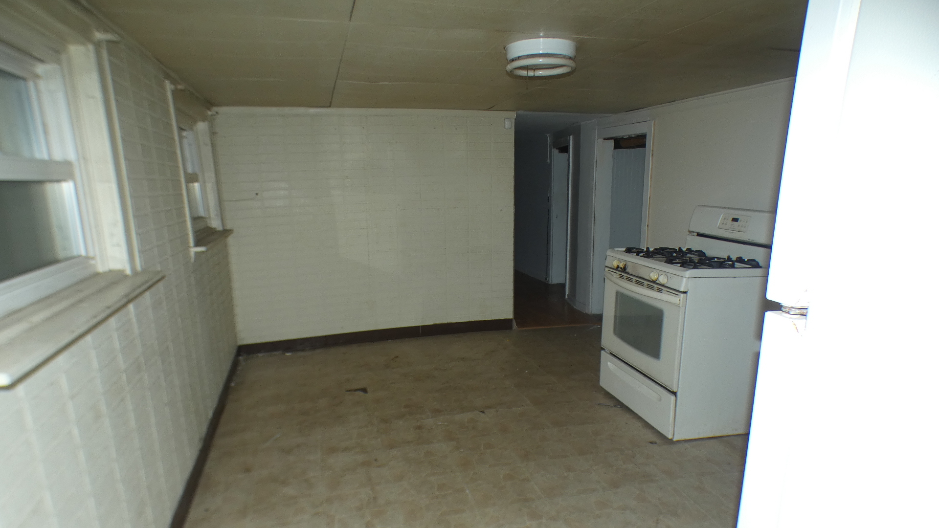 8133 South Loomis Boulevard Chicago, IL 60620 - Photo 30 of 32 a view of a storage & utility room with washer and dryer
