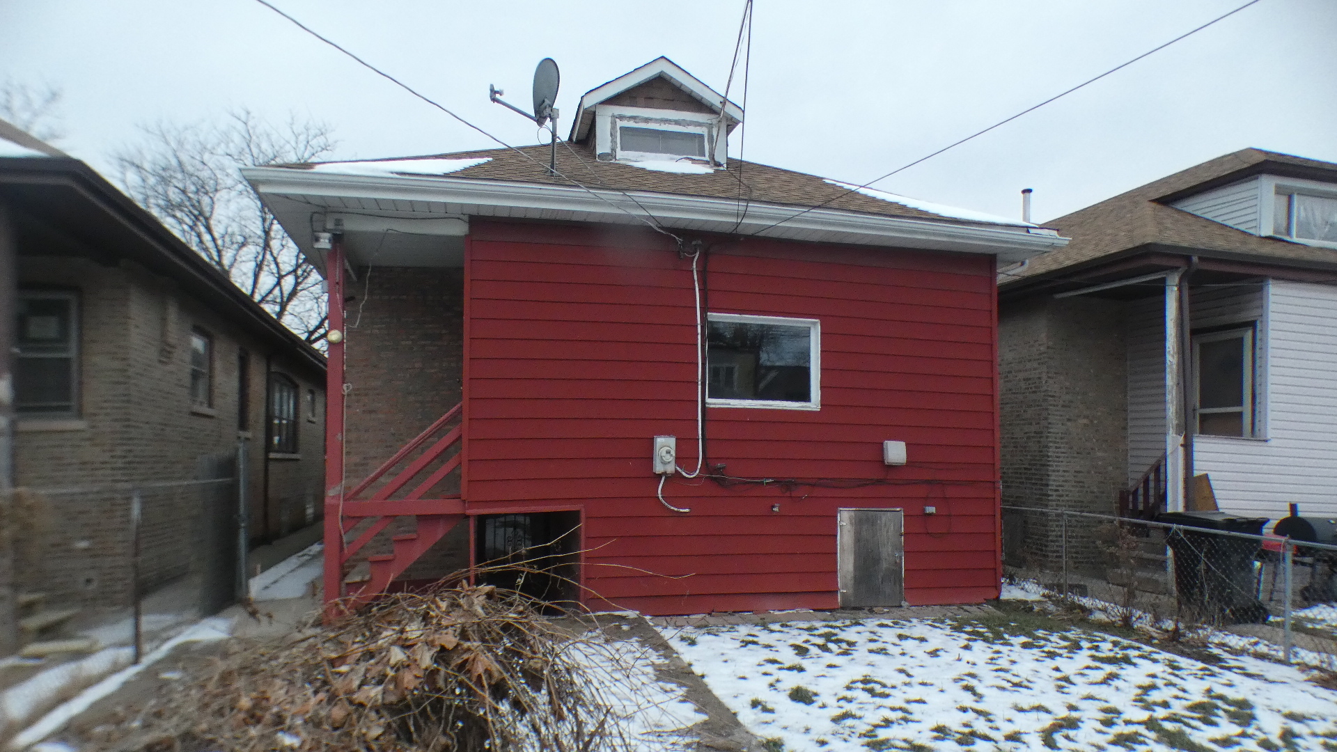 8133 South Loomis Boulevard Chicago, IL 60620 - Photo 32 of 32 a front view of a house with a yard