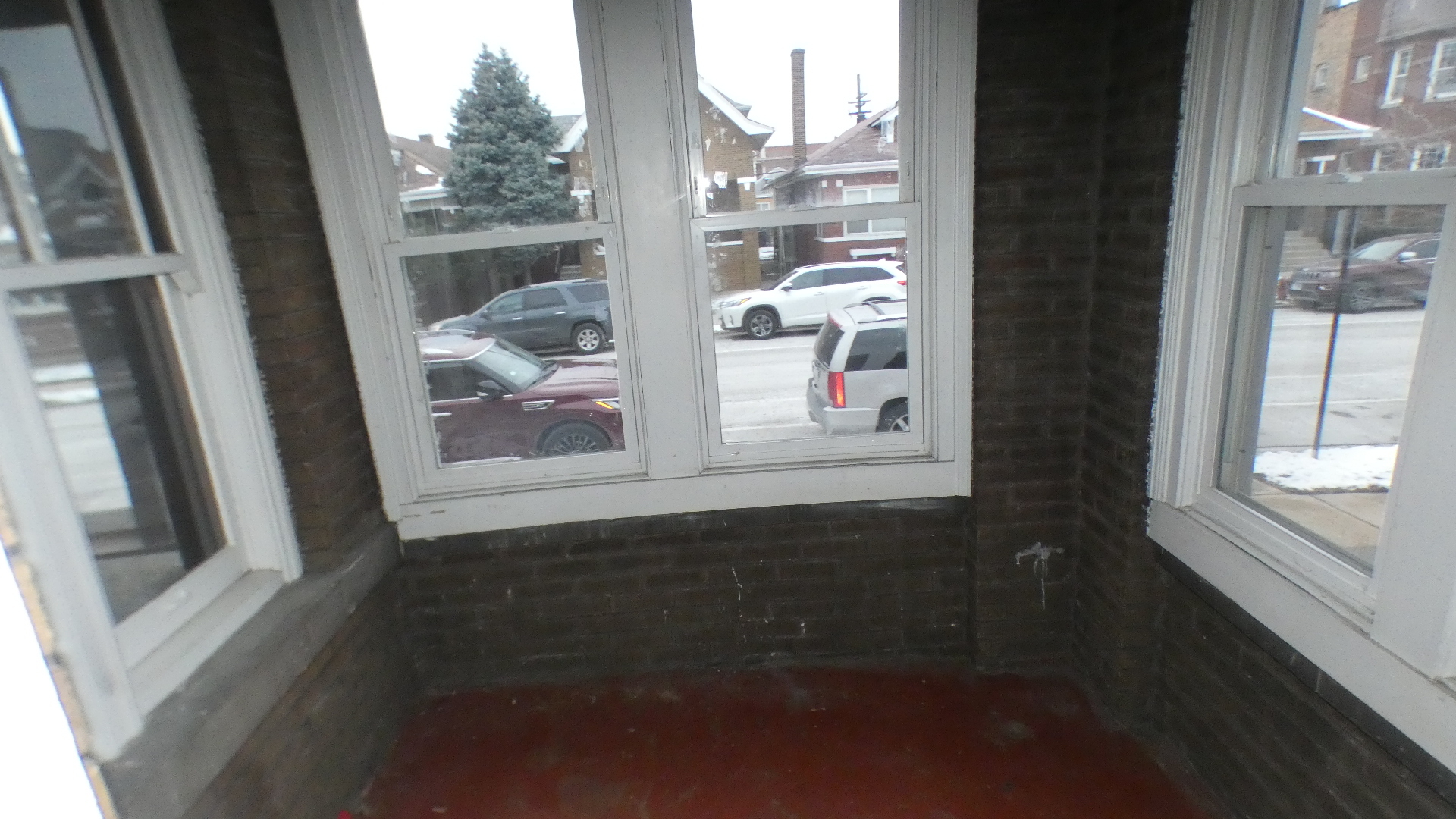 8133 South Loomis Boulevard Chicago, IL 60620 - Photo 7 of 32 a view of a window of the house