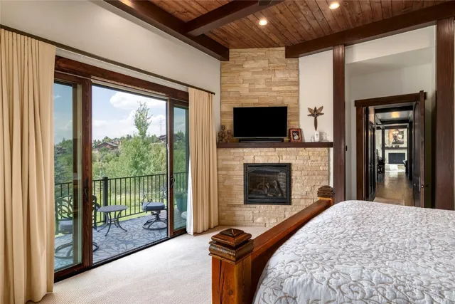 a view of a chairs and table in patio