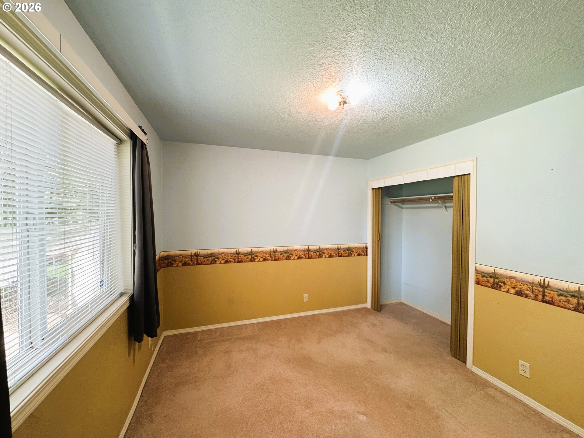 1918 Southeast Regner Road Gresham, OR 97080 - Photo 42 of 48 a view of an empty room with a window