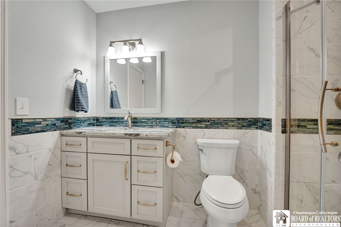 4406 West Lake Road, Unit 24 Chautauqua, NY 14757 - Photo 25 of 42 Beautiful Full bath with tile shower and glass sho