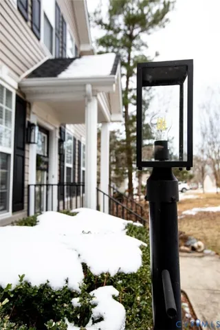 a view of a patio with table and chairs