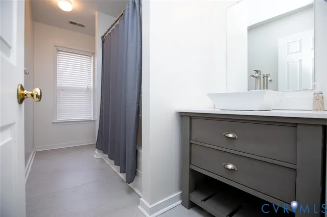 a room with a closet and a window