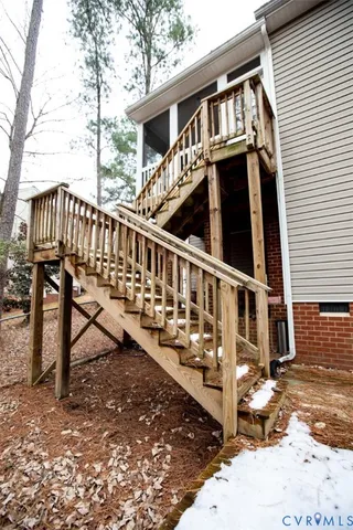 a view of a house with a small yard