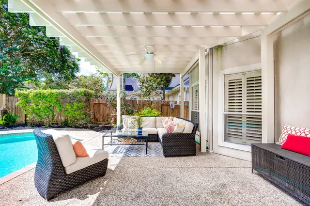 a outdoor living space with furniture and garden view