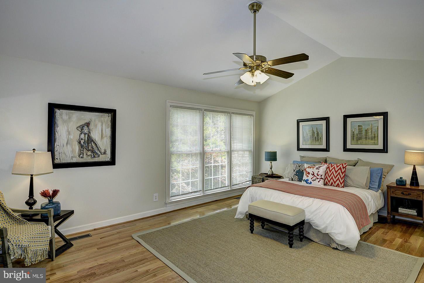 9730 Hidden Valley Road Vienna, VA 22181 - Photo 15 of 30 a bedroom with a bed and a window