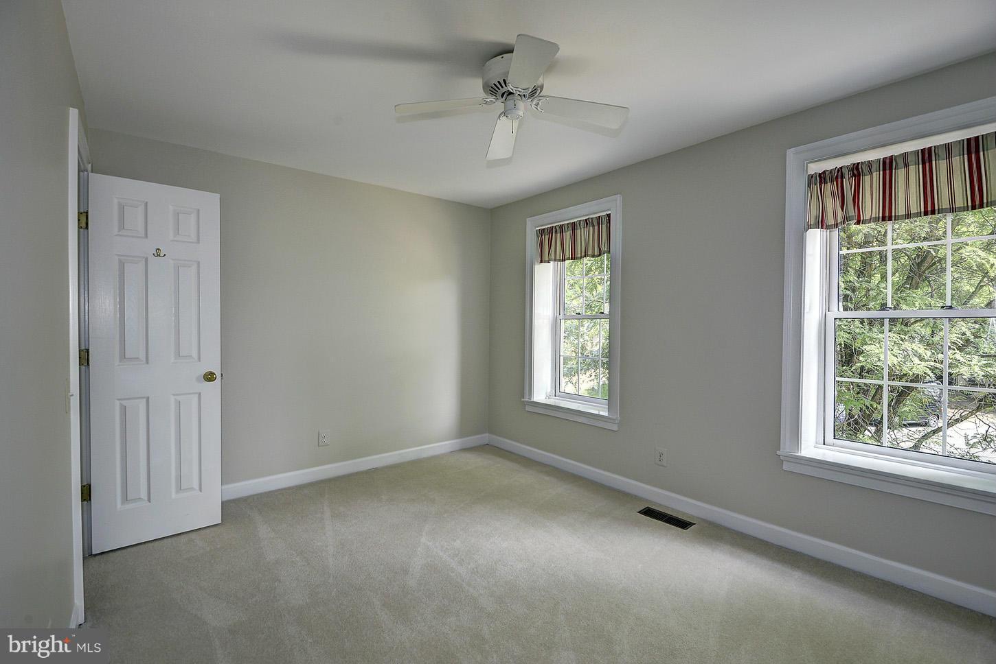 9730 Hidden Valley Road Vienna, VA 22181 - Photo 18 of 30 a view of an empty room with a window