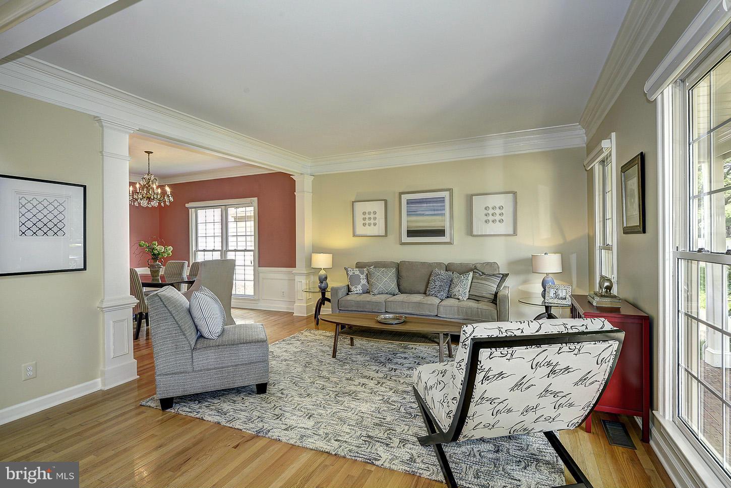 9730 Hidden Valley Road Vienna, VA 22181 - Photo 3 of 30 a living room with furniture and a couch