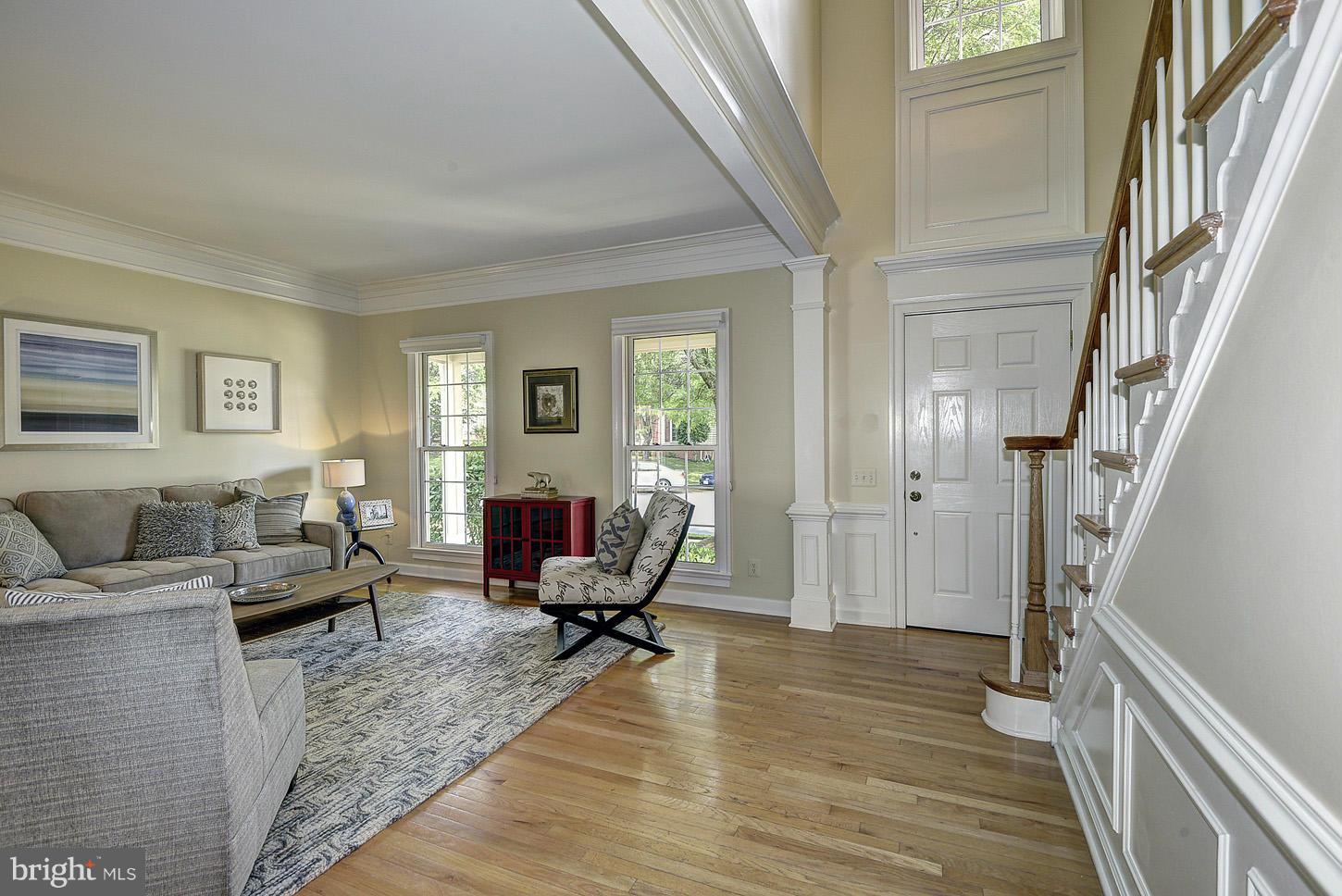 9730 Hidden Valley Road Vienna, VA 22181 - Photo 5 of 30 a living room with furniture and a couch