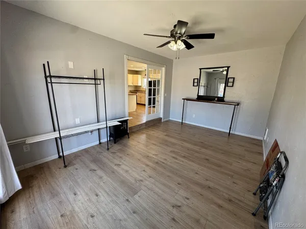 a view of a livingroom with wooden floor