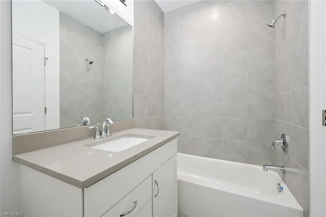 a bathroom with a sink and a bathtub