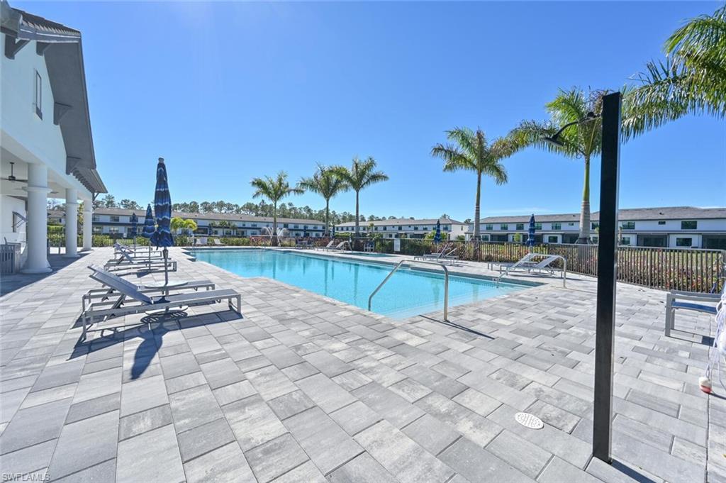 7611 Morgan Way Naples, FL 34119 - Photo 25 of 26 a view of a terrace with chairs