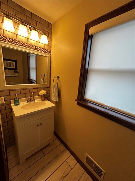 22 Dawn Drive Indiana, PA 15701 - Photo 11 of 27 a bathroom with a sink and a mirror