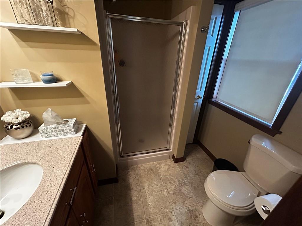 22 Dawn Drive Indiana, PA 15701 - Photo 15 of 27 a bathroom with a sink and a mirror