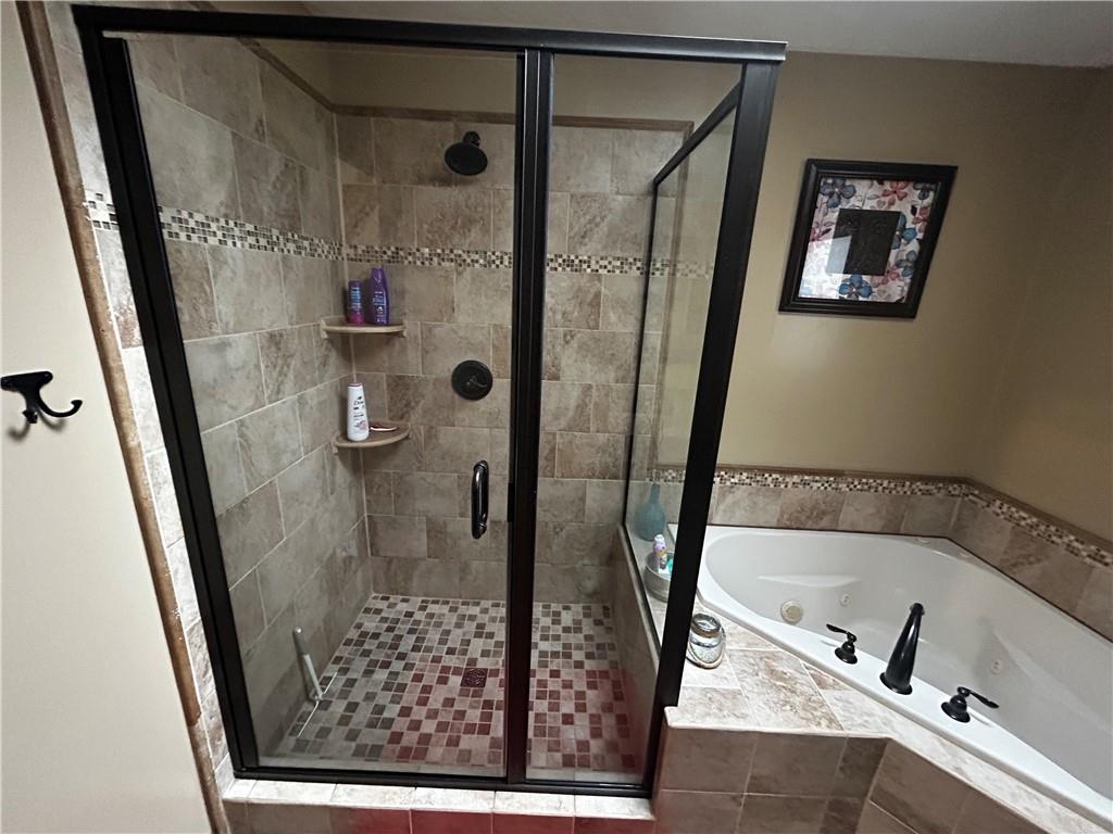 22 Dawn Drive Indiana, PA 15701 - Photo 18 of 27 a bathroom with a bathtub and shower