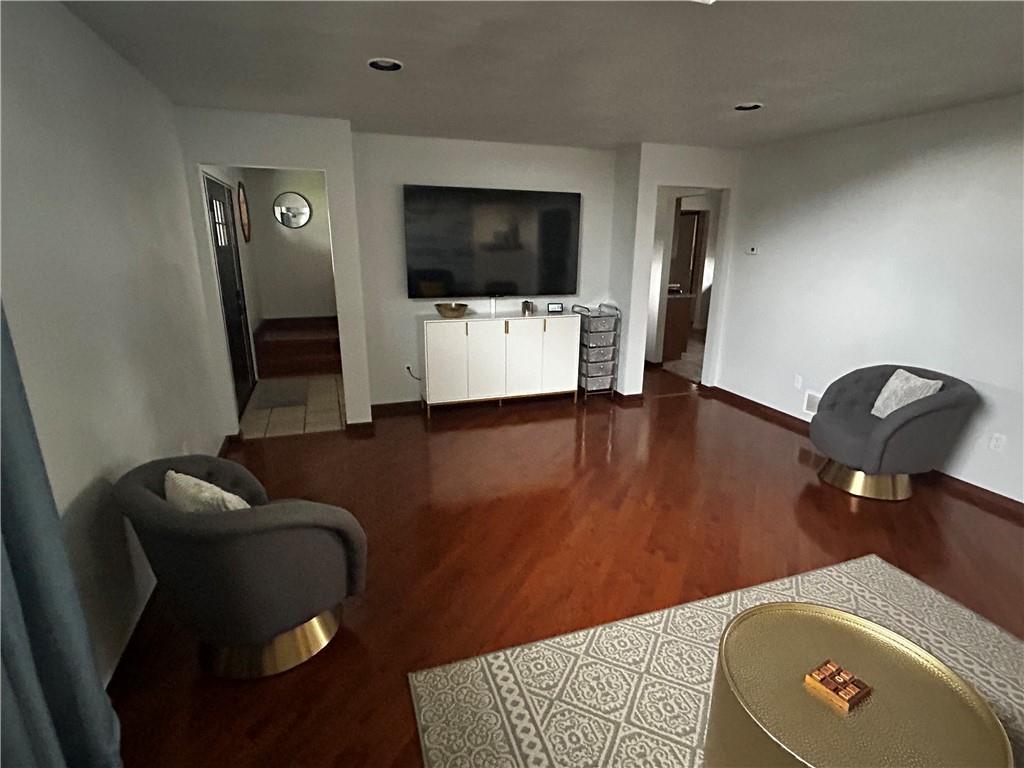 22 Dawn Drive Indiana, PA 15701 - Photo 2 of 27 a living room with furniture and a flat screen tv