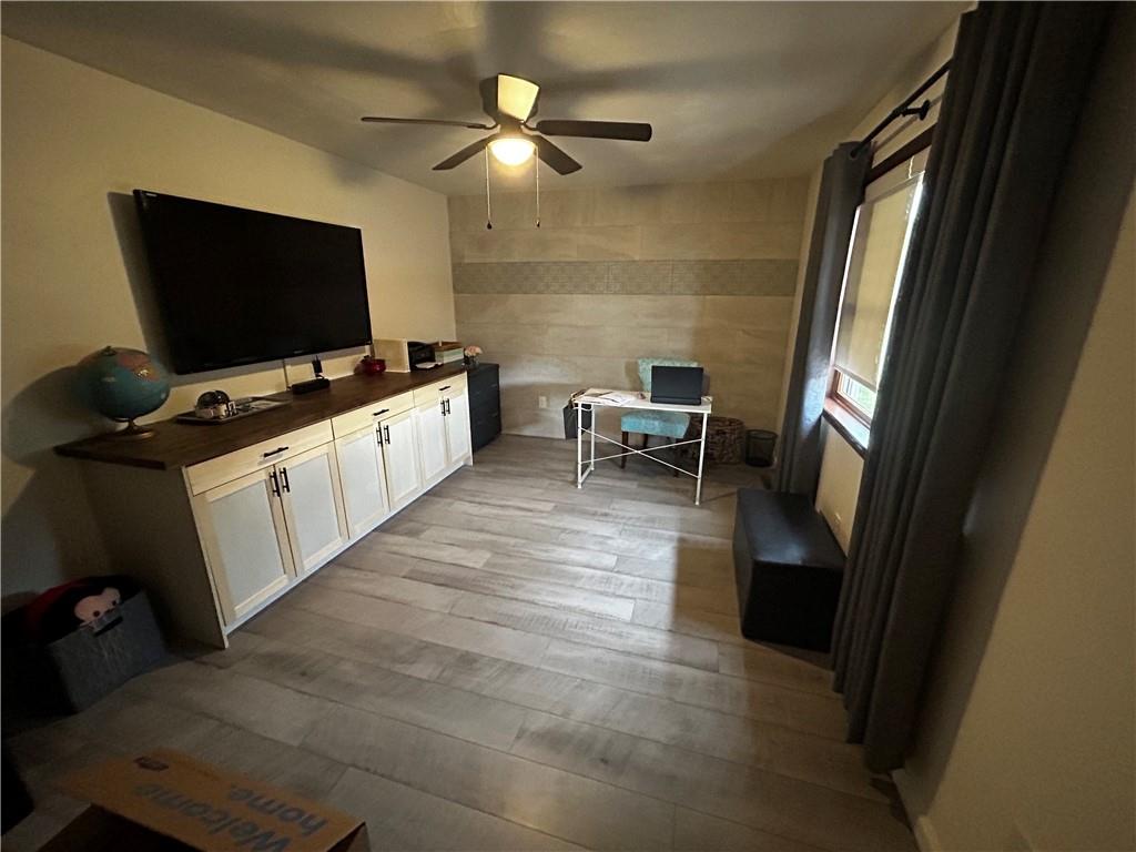22 Dawn Drive Indiana, PA 15701 - Photo 10 of 27 a kitchen with a stove and a flat screen tv