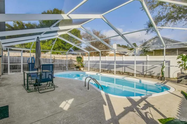a view of a patio with a garden