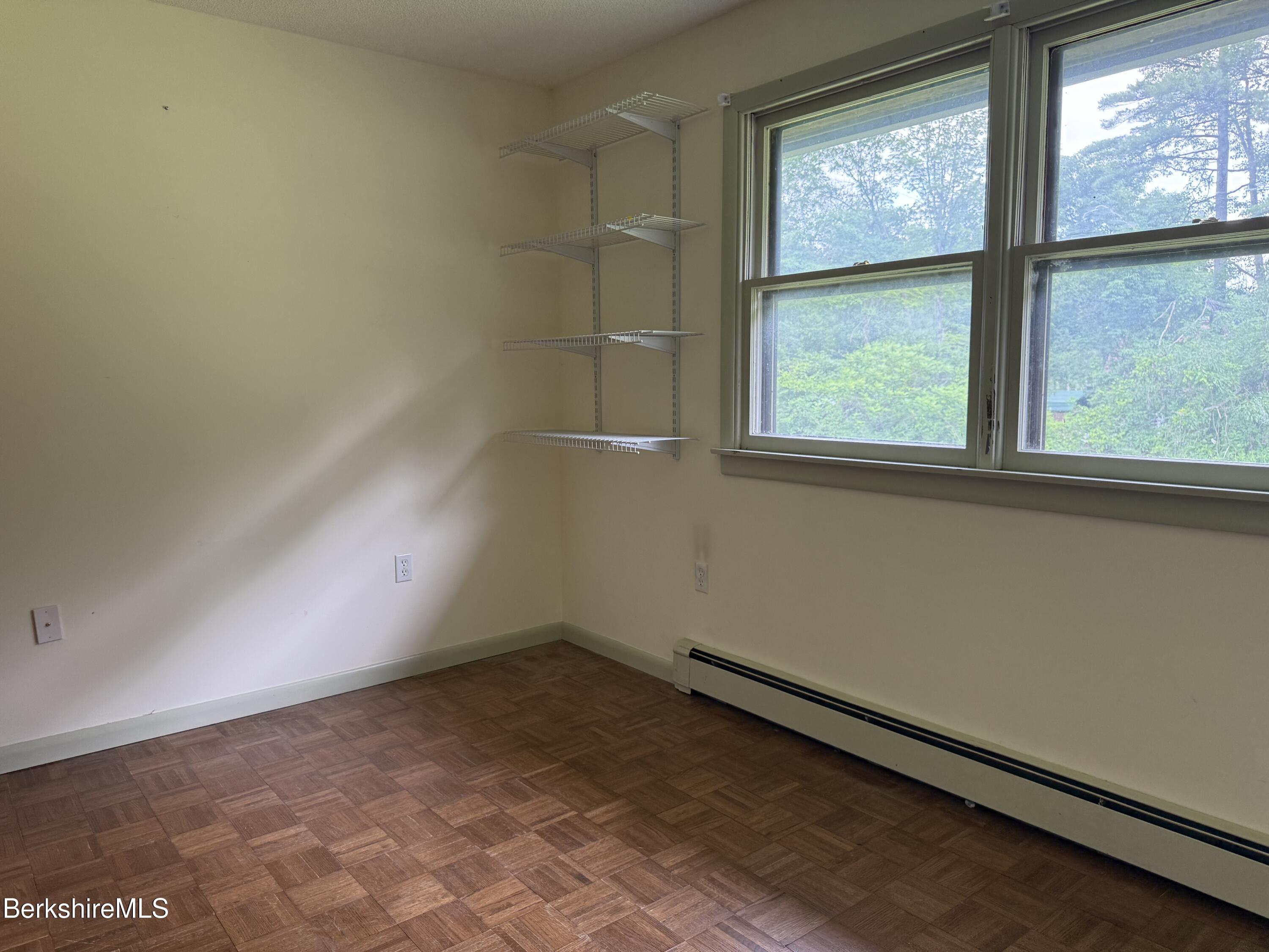 153 East Dugway Road Lenox, MA 01240 - Photo 20 of 26 a view of a room that has a window in it