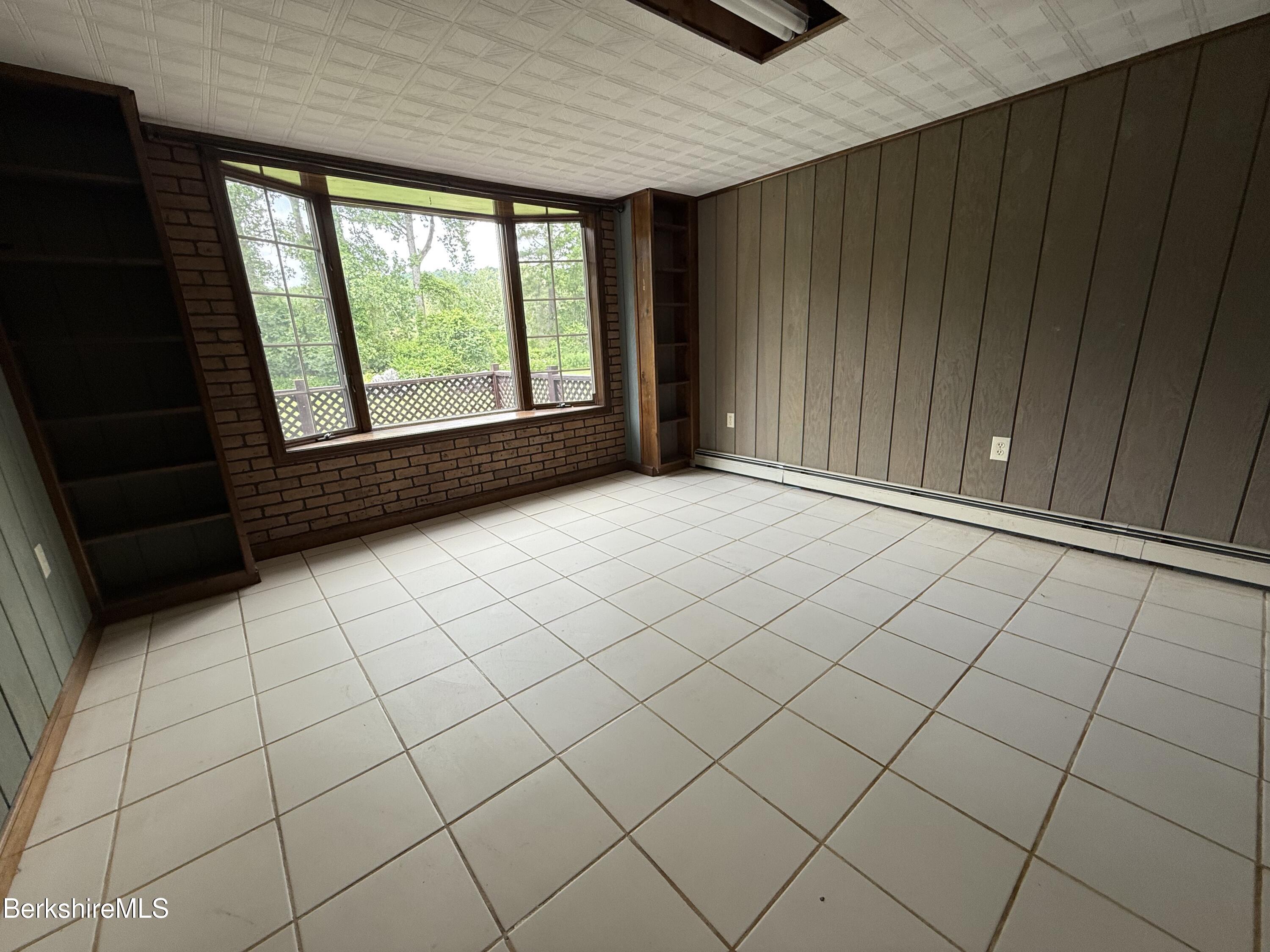 153 East Dugway Road Lenox, MA 01240 - Photo 22 of 26 an empty room with windows