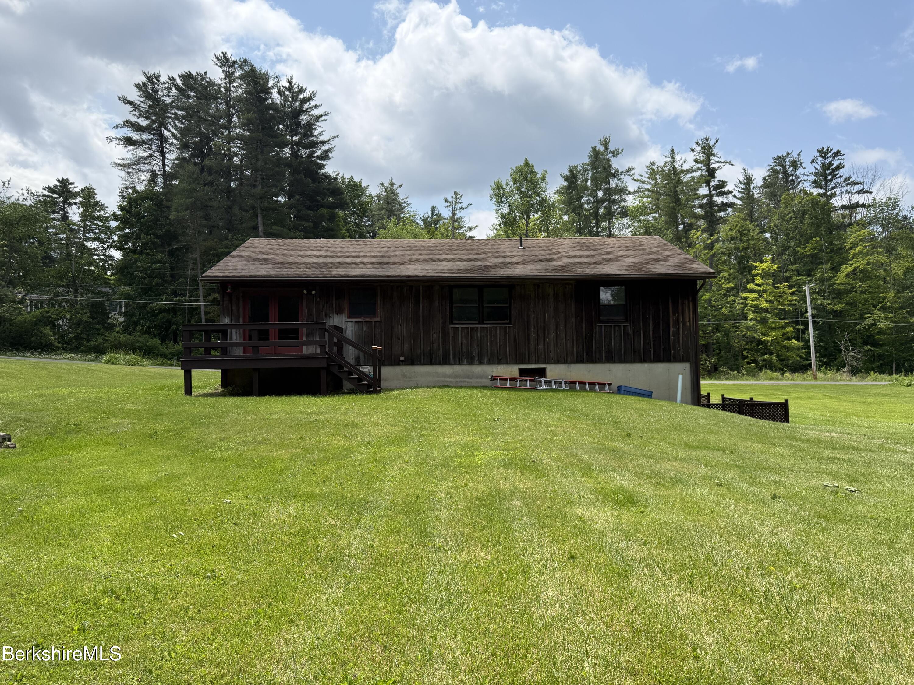 153 East Dugway Road Lenox, MA 01240 - Photo 3 of 26 a view of a house with a yard
