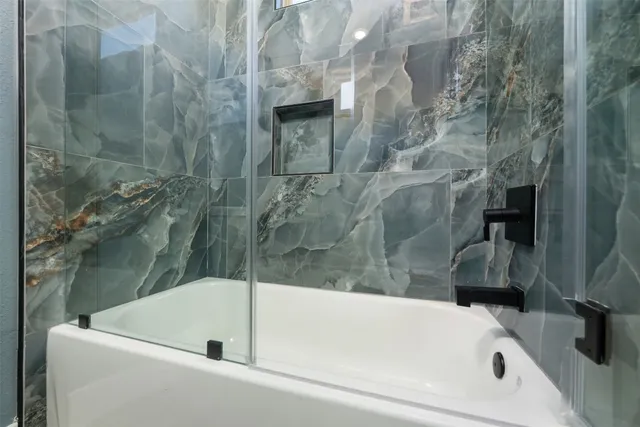 a bathroom with a bathtub