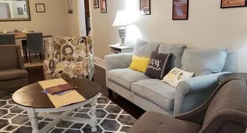 a living room with furniture and a couch