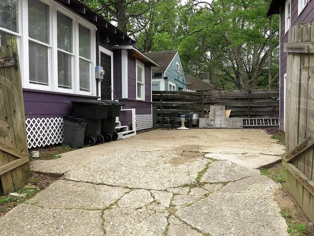 a view of house with yard
